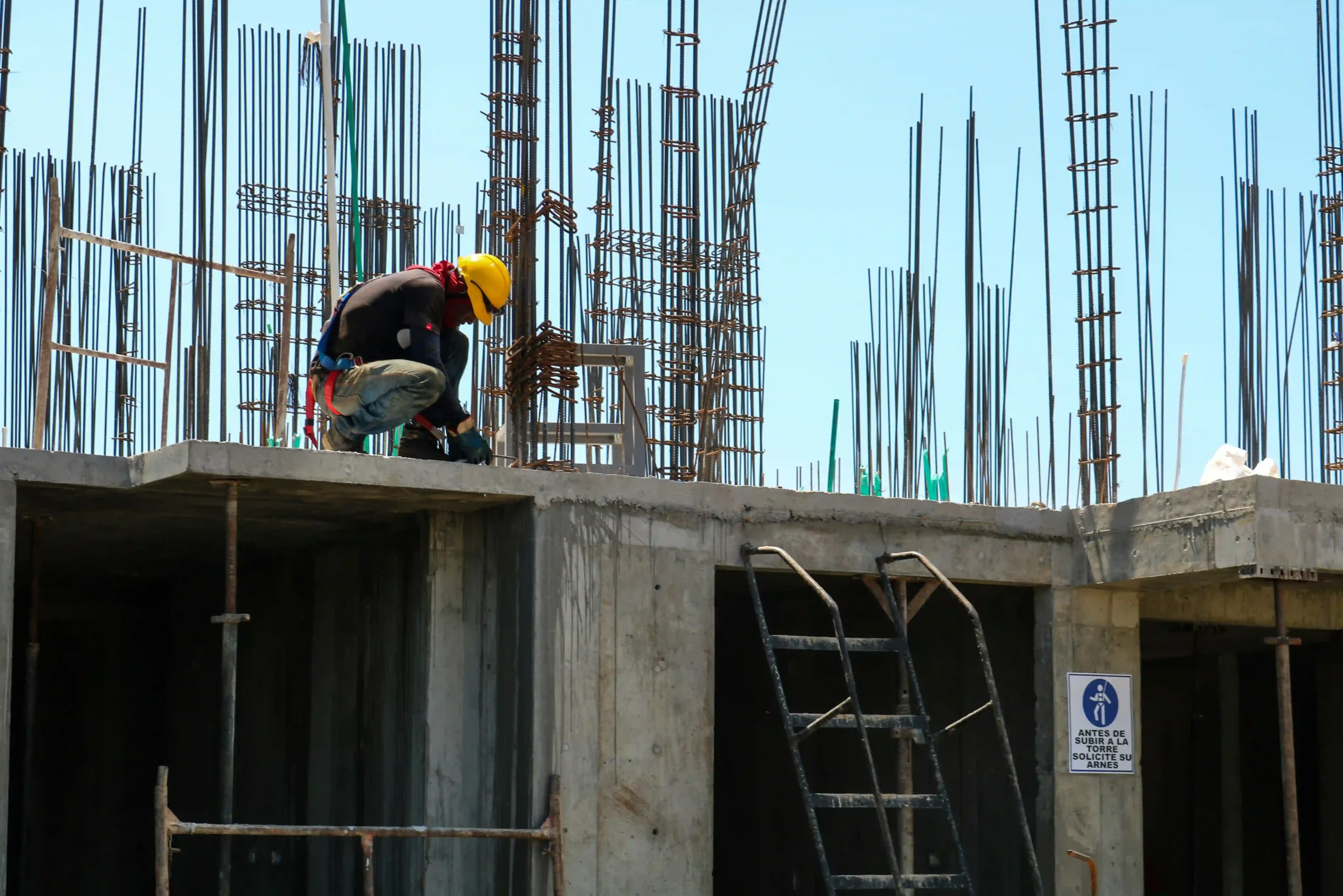 A detailed building permit document on a desk, symbolizing construction approval in Bali.