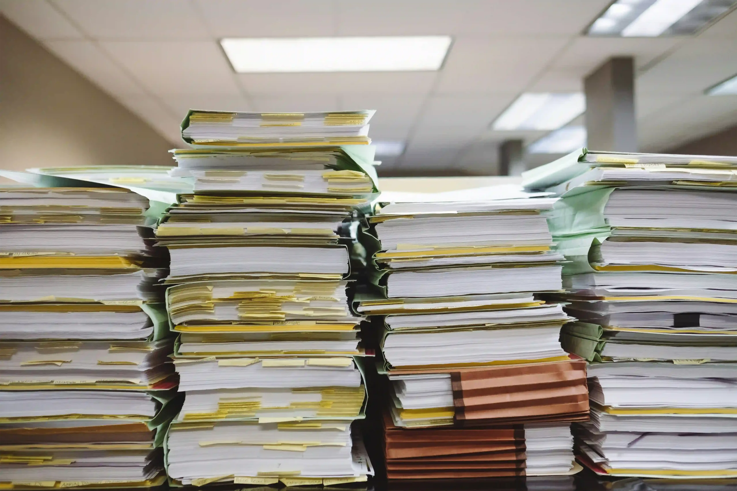 A company document being revised, representing legal services for corporate updates by Bali Visas.